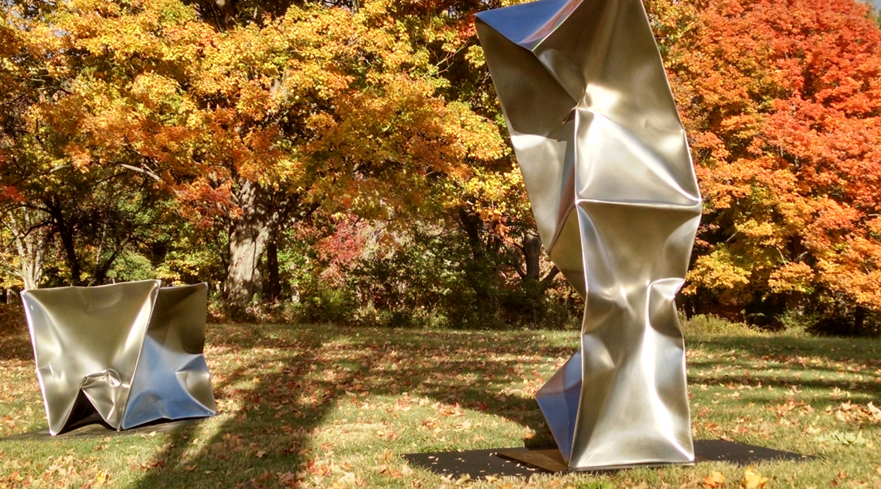 Ewerdt Hilgemann, Imploded Cube and Double NY, 2012-2013, Stainless steel